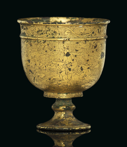 A SMALL FINELY-ENGRAVED GILT-BRONZE STEM CUP, TANG DYNASTY (AD 618-907)