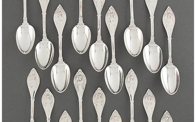 A Set of Eighteen George W. Shiebler Medallion Pattern Silver Teaspoons (designed 1890)