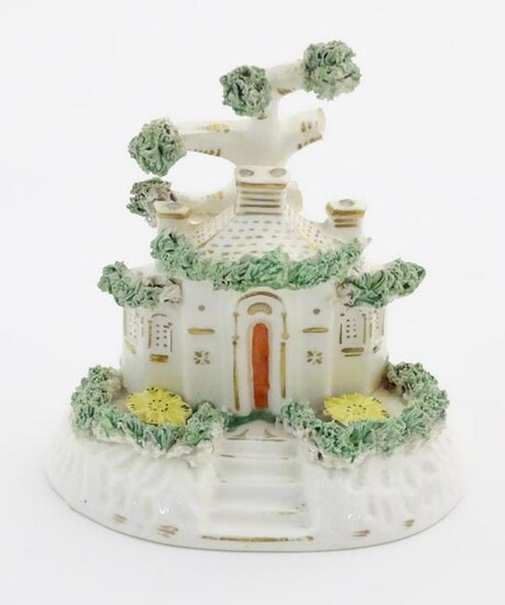 A Staffordshire pottery model of a cottage. Approx. 4