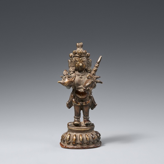 A Tibetan dark patinated brass figure of Vajrayogini. 19th century