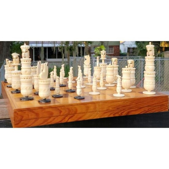A Very Finely Carved Chess Set Painted