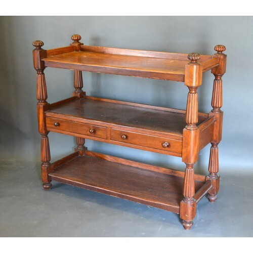 A Victorian Mahogany Buffet, the low galleried top above two...