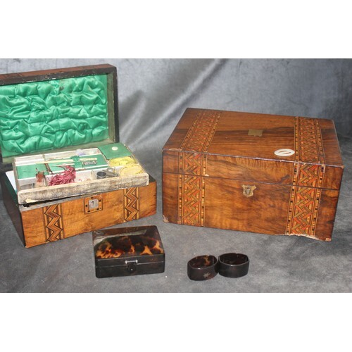 A Victorian inlaid walnut sewing box, a writing box, and a s...