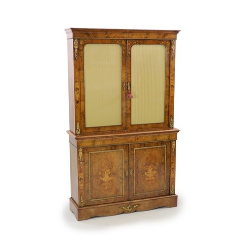 A Victorian ormolu mounted marquetry inlaid walnut bookcase,...