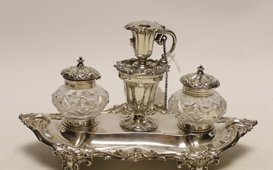 A Victorian silver inkstand, with two mounted glass wells an...