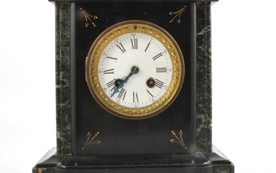 A black marble mantel clock.
