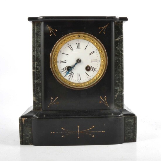 A black marble mantel clock.