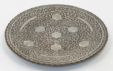 A copper-alloy silver overlaid shallow footed dish Iran, first half 20th century...