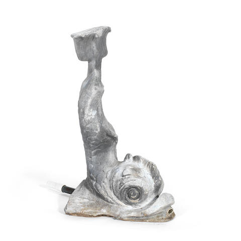 A decorative cast lead Dolphin fountain head