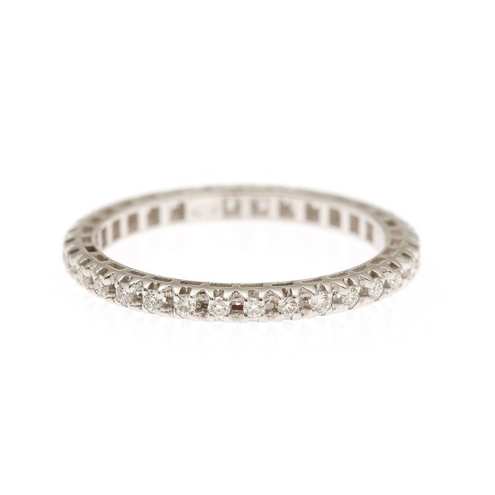 A diamond eternity ring set with numerous brilliant-cut diamonds totalling app. 0.28 ct., mounted in 18k white gold. Size 55.
