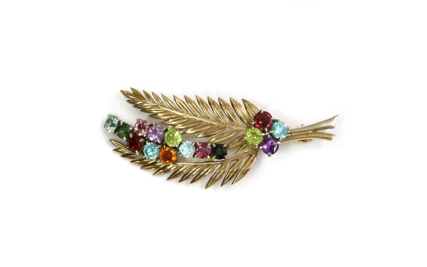 A gold assorted gemstone fern brooch