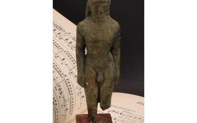 A green patinated bronze figure, Greek Kouros, in the Grand ...