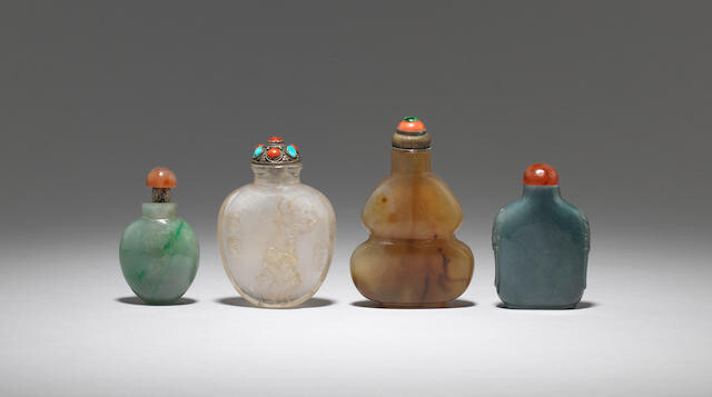 A group of four variously jadeite and hardstone snuff bottles