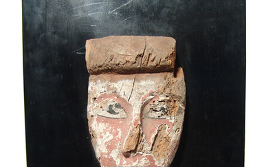 A large Egyptian painted wood mummy mask