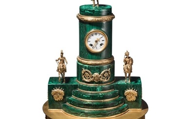 A large fire-gilt malachite and ormolu-mounted table clock