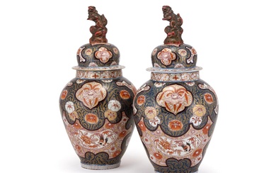 A large pair of Samson or Continental Imari vases and covers