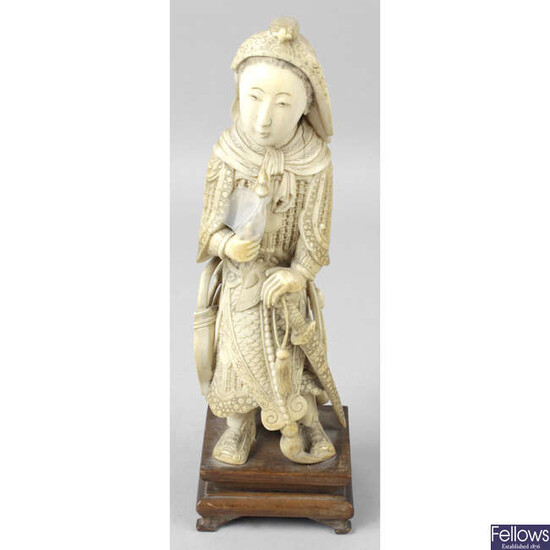 A late 19th century oriental carved ivory figure