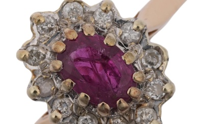 A late 20th century 9ct gold ruby and diamond oval cluster r...