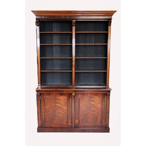 A mid 19th century rosewood library open bookcase, with a ca...