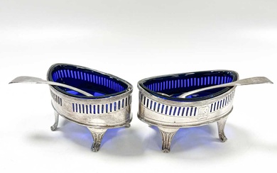 A pair of George III 18th century silver salts with later spoons