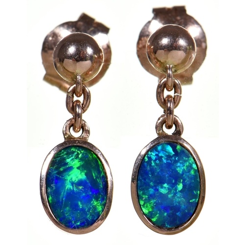 A pair of black opal doublet pendant earrings, in gold, 1.7g