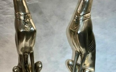 A pair of handcast bronze silverized whippets mounted