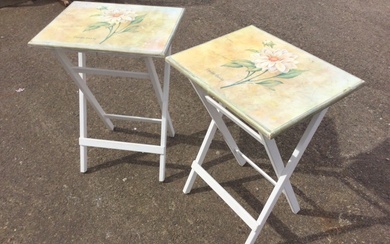 A pair of painted folding occasional tables, the rectangular tops...