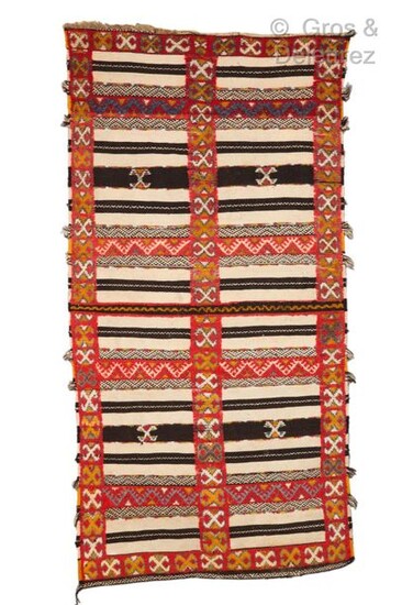 A rug in mixed technique knotted and woven from Ait...