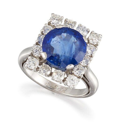 A sapphire and diamond cluster ring, designed as a square-shaped...