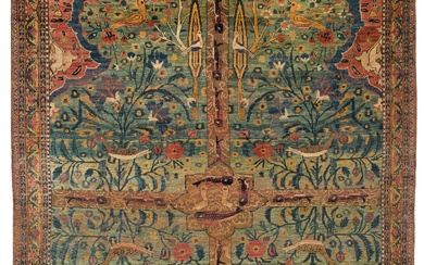 A silk Kirman double-niche garden rug, signed by Ibrahim ibn...
