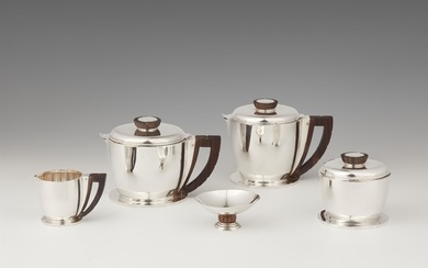 A silver tea and coffee service made by Jean-Emile Puiforcat