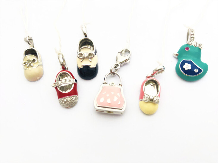 A special lot of charm pendants, 18K gold with...