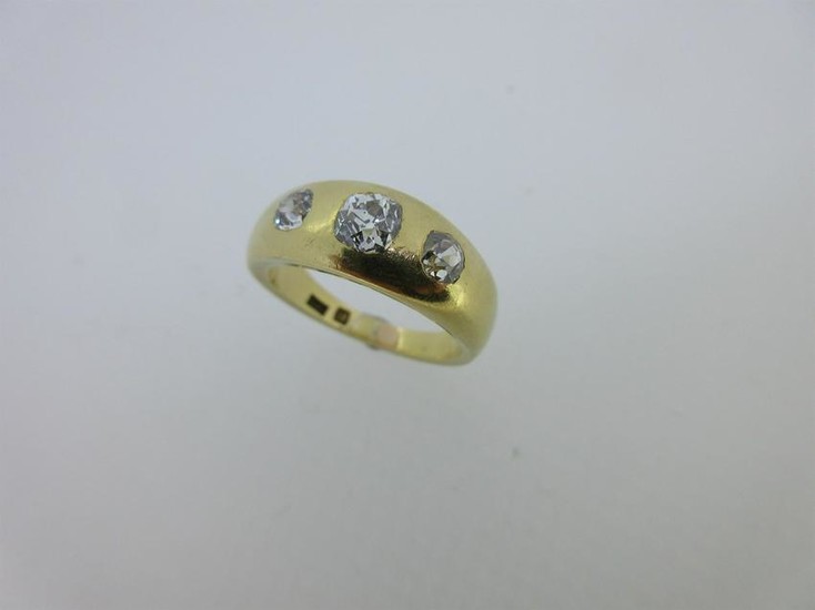 A three stone diamond 'gypsy' ring