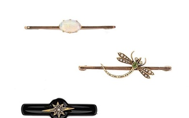 A trio of gemset brooches