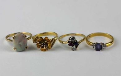 An 18ct gold diamond and blue gem set ring
