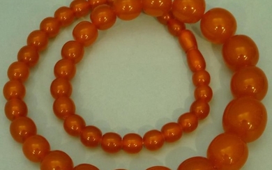An Amber Graduated Bead Necklace, 50.4g.