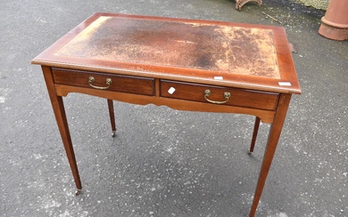 An Edwardian mahogany leather top writing table having two frieze drawers, width appprox 92, depth