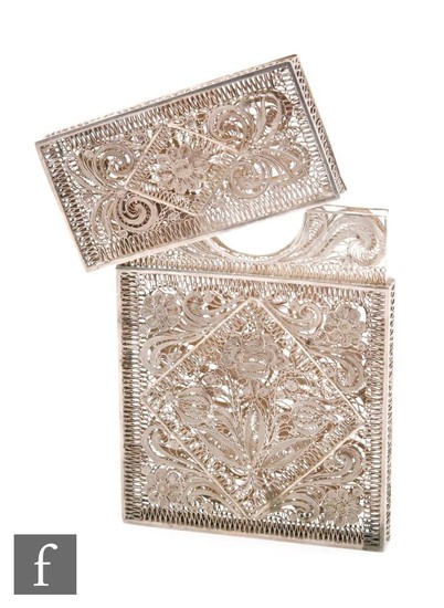 An Indian low grade silver filigree work card case, the cent...