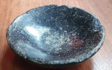 An ancient Egyptian polished granite bowl, 4" diameter.