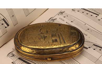 An early 18th century Dutch brass oval tobacco box, engraved...