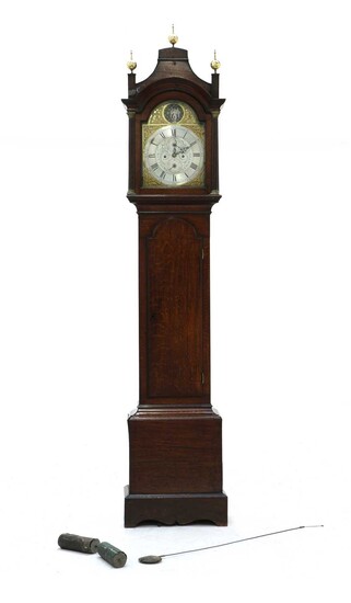 An oak eight day longcase clock