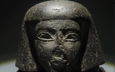 Ancient Egyptian Granodiorite Head of a Dignitary. New Empire, 1550 - 1070 B.C. 11 cm length. Spanish Import License.