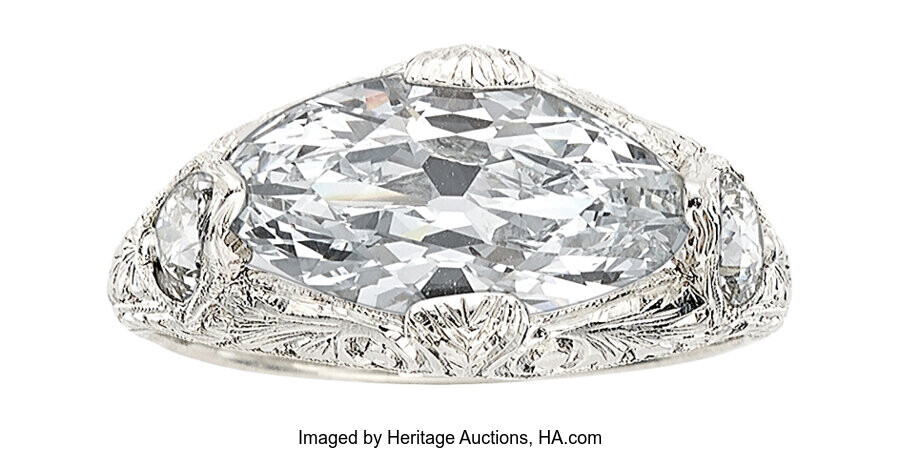 Art Deco Diamond, Platinum Ring Stones: Modified marquise brilliant-cut...