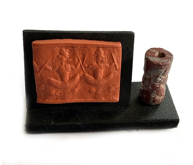 Assyrian Mesopotamian Red Granite Cylinder Seal, Figures In Boats on the River
