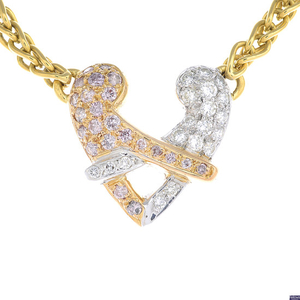 BOODLES - an 18ct gold diamond and 'pink' diamond 'Hug' necklace.