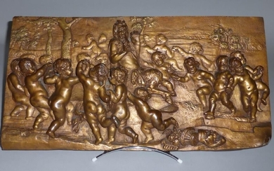 Bas-relief rectangulaire en métal patiné à décor d'une bacchanale. (choc à un angle) 29 x...
