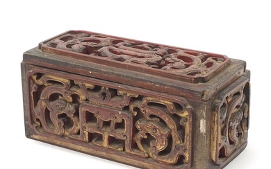 Chinese lacquered wood casket carved with mythical dragons, ...
