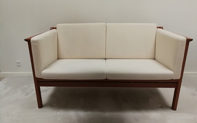 NOT SOLD. Christian Hvidt: Two-seater sofa with mahogany frame. Manufactured by Søborg Møbler. H. 76....
