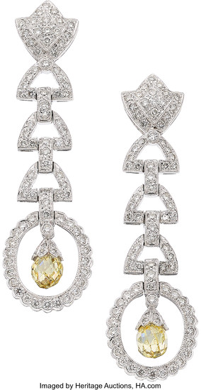 Diamond, Colored Diamond, White Gold Earrings The earrings feature...