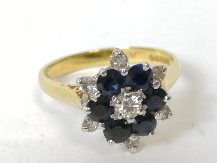 Diamond and sapphire cluster ring in 18ct gold. Size 'N'.